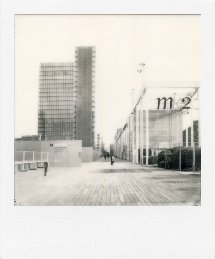 Black and white Polaroid of Paris. Esplanade in front of the cinema mk2, bibliotheque Francois Mitterrand. Paris on March 17th 2021. Photo by Virginie Merle / Hans Lucas. 
Esplanade devant le cinema mk2, bibliotheque Francois Mitterrand. Paris le 17 Mars 2021. Photo de Virginie Merle / Hans Lucas.