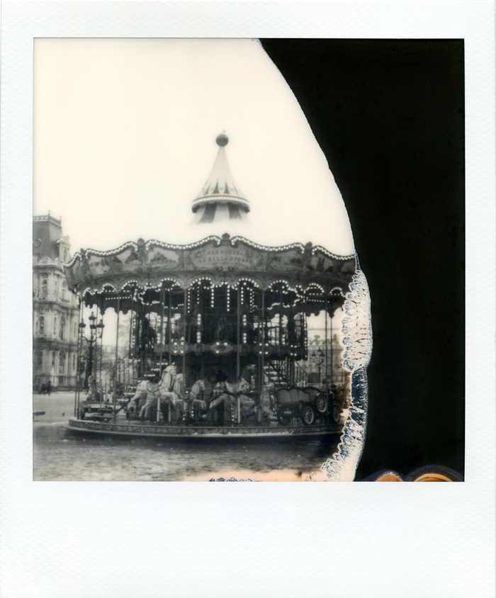 Black and white Polaroid from Paris. Carousel on the Place de l Hotel de Ville. Paris on February 18th 2019. Photo Virginie Merle / Hans Lucas. 
Polaroid noir et blanc de Paris. Manege sur la place de l Hotel de Ville. Paris le 18 Fevrier 2019. Photo Virginie Merle / Hans Lucas.